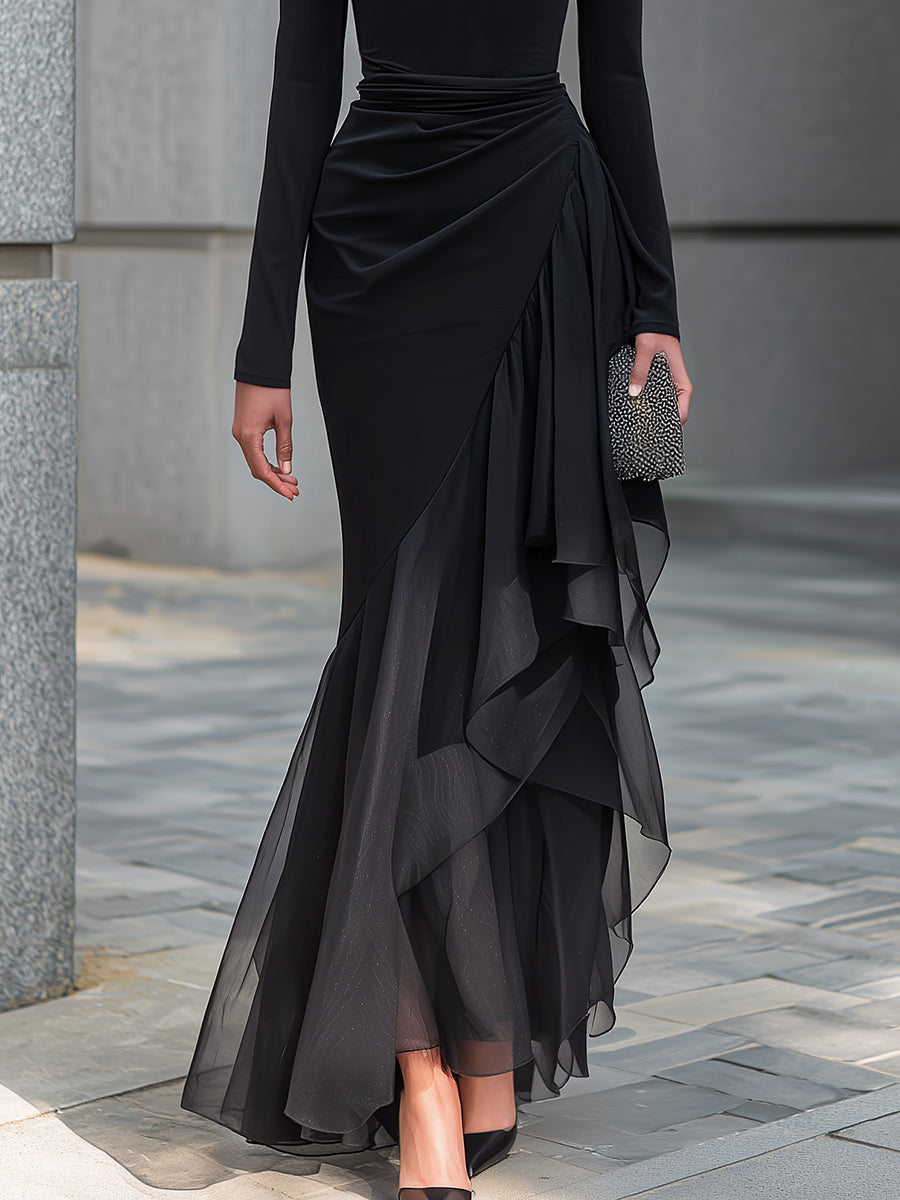 Vestido largo negro corte sirena con escote drapeado y hombros descubiertos