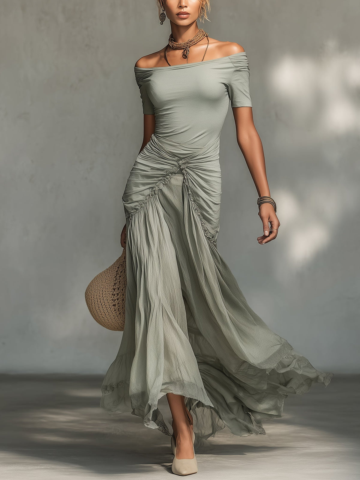 Vestido largo gris de tejido elástico y gasa