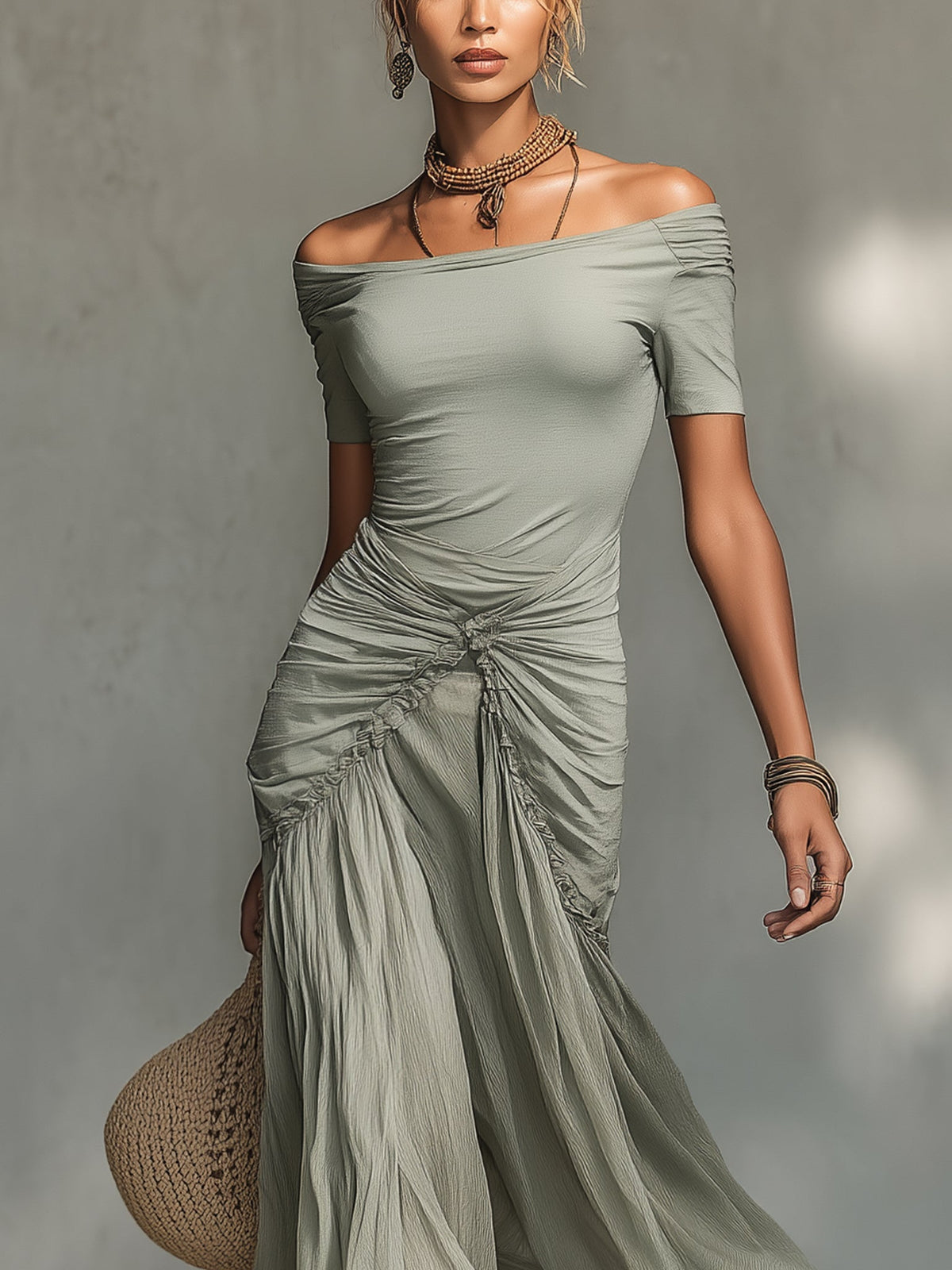 Vestido largo gris de tejido elástico y gasa