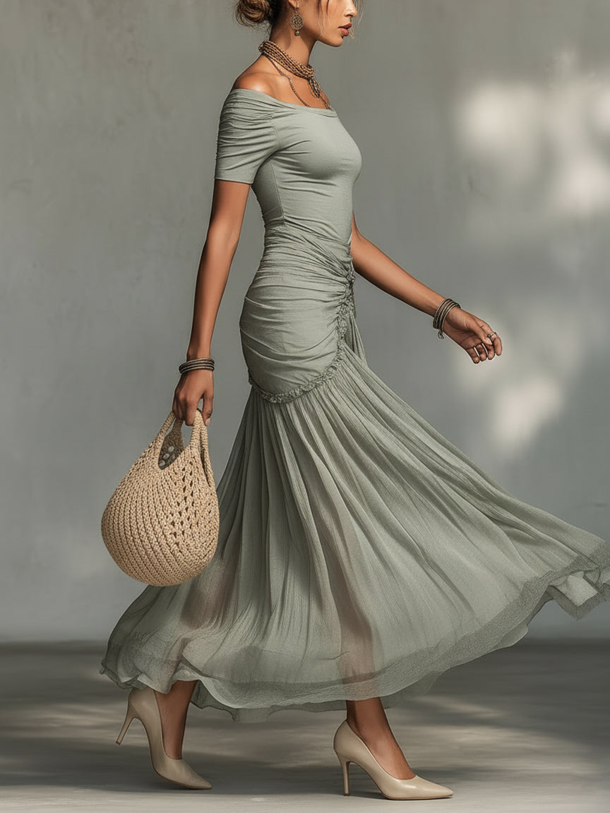 Vestido largo gris de tejido elástico y gasa