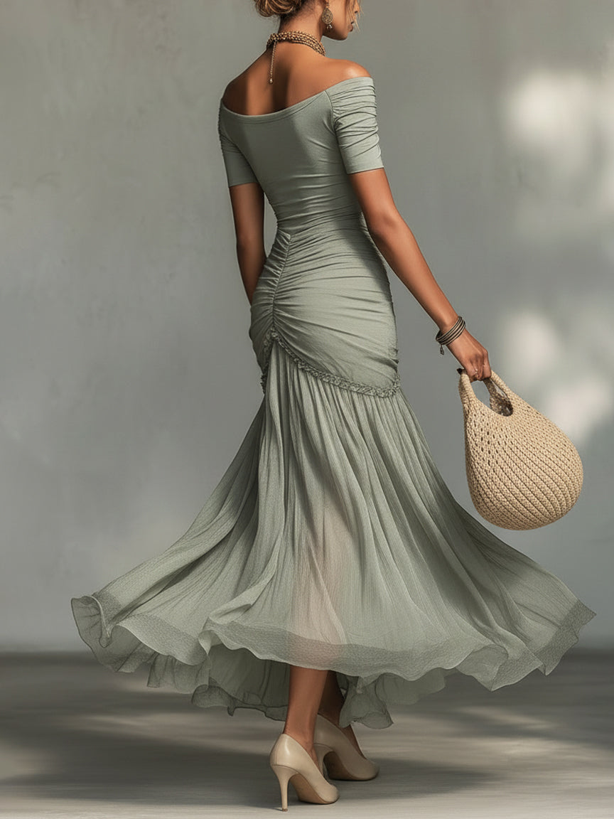 Vestido largo gris de tejido elástico y gasa