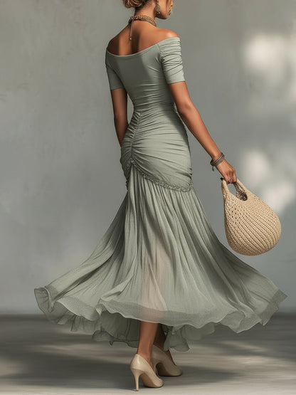 Vestido largo gris de tejido elástico y gasa