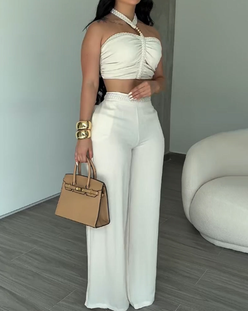 Conjunto Dos Piezas Top Halter Trenzado y Pantalón de Campana