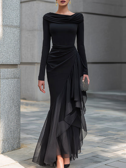 Vestido largo negro corte sirena con escote drapeado y hombros descubiertos