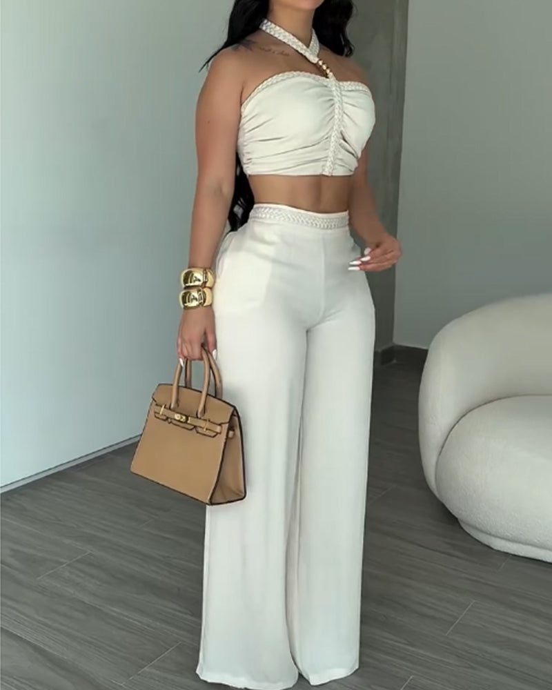 Conjunto Dos Piezas Top Halter Trenzado y Pantalón de Campana