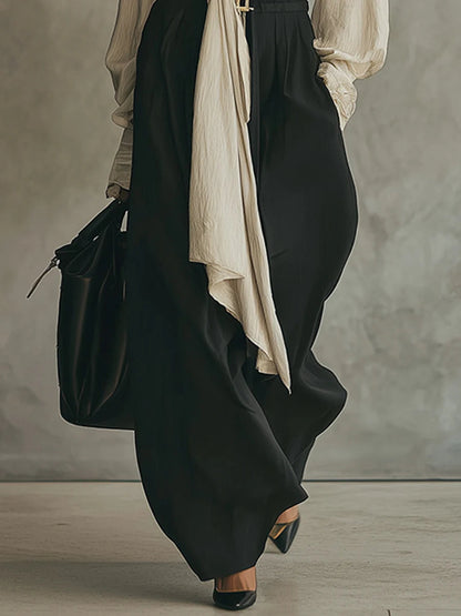 Conjunto de camisa beige anudada y pantalón negro