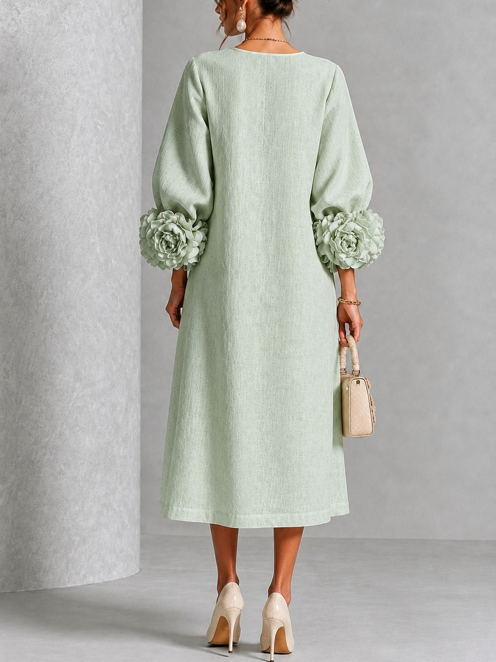 Vestido midi verde salvia con botones y puños de flores