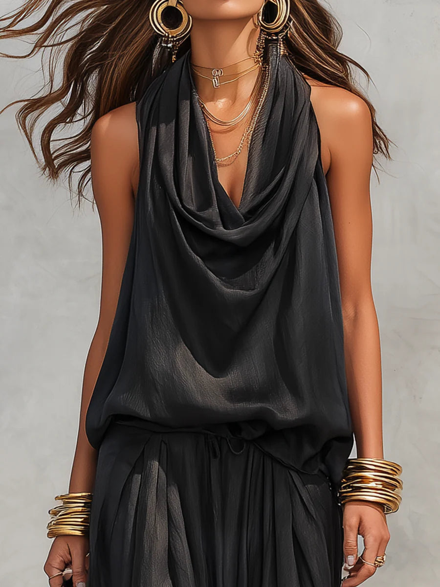 Conjunto de top halter y pantalón plisado en negro