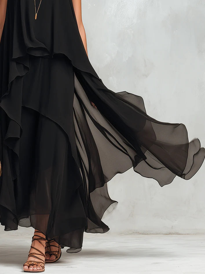Vestido largo negro de gasa por capas y sin mangas