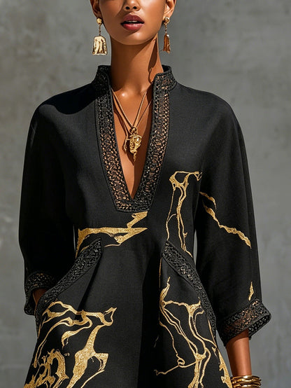 Vestido corto negro con estampado dorado y crochet