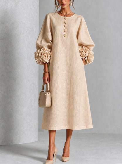 Vestido midi beige con botones y puños de flores