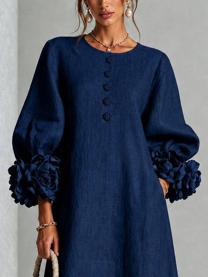 Vestido midi azul marino con botones y puños de flores