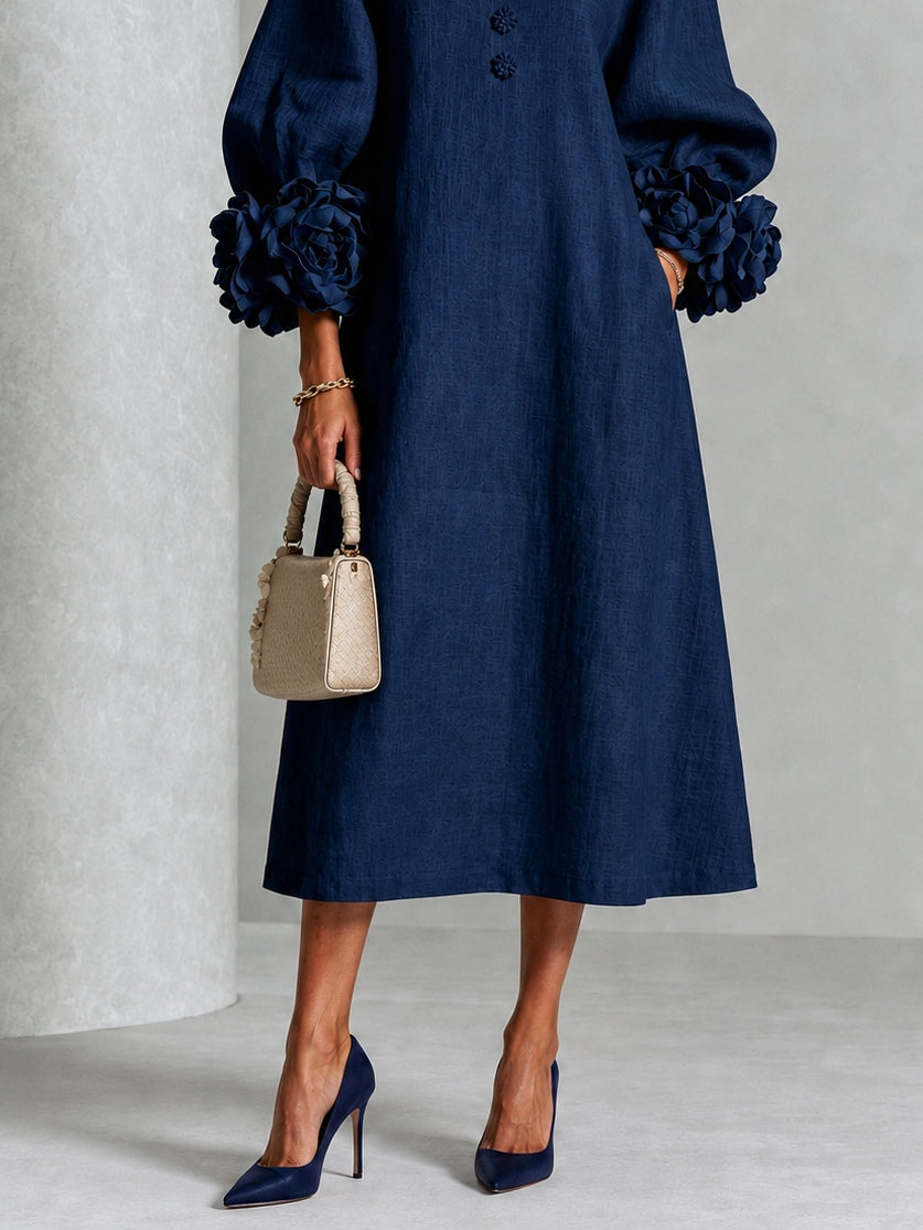 Vestido midi azul marino con botones y puños de flores