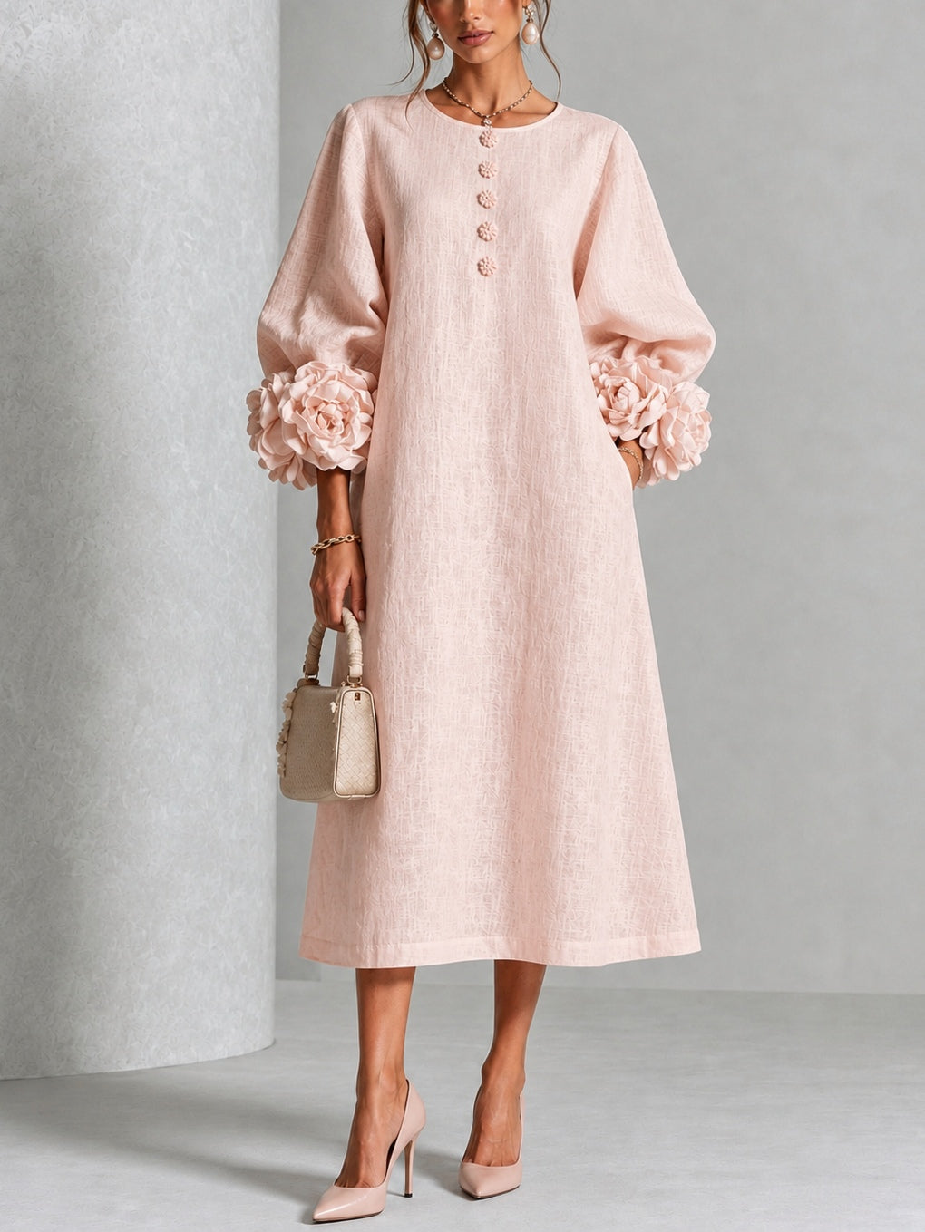 Vestido midi rosa con botones y puños de flores