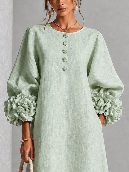 Vestido midi verde salvia con botones y puños de flores