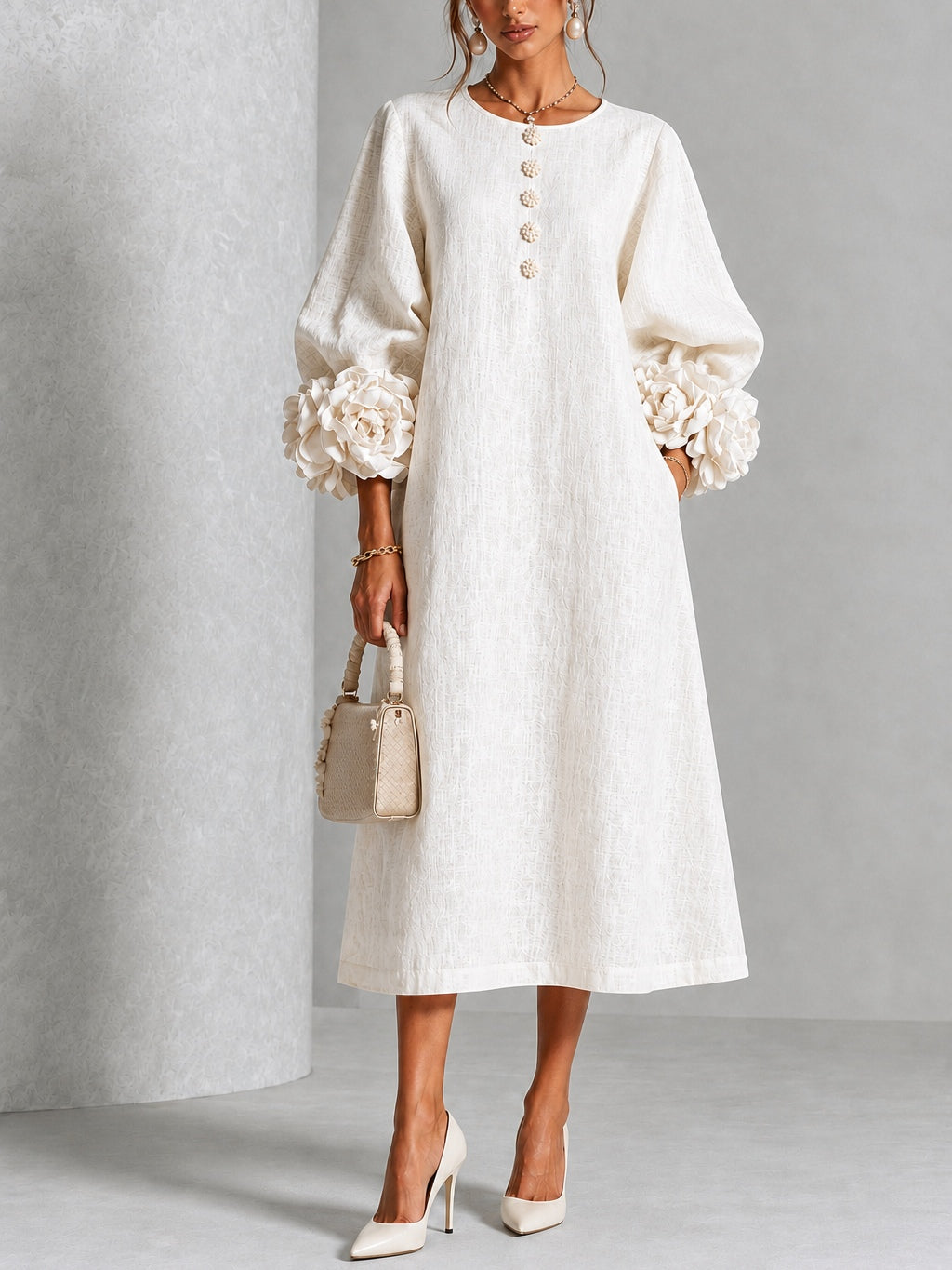 Vestido midi blanco con botones y puños de flores