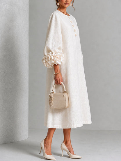 Vestido midi blanco con botones y puños de flores