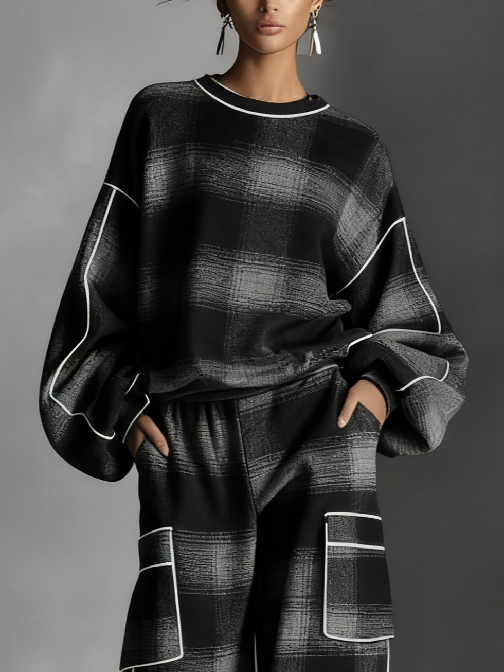 Conjunto de sudadera y pantalón de cuadros en negro y gris