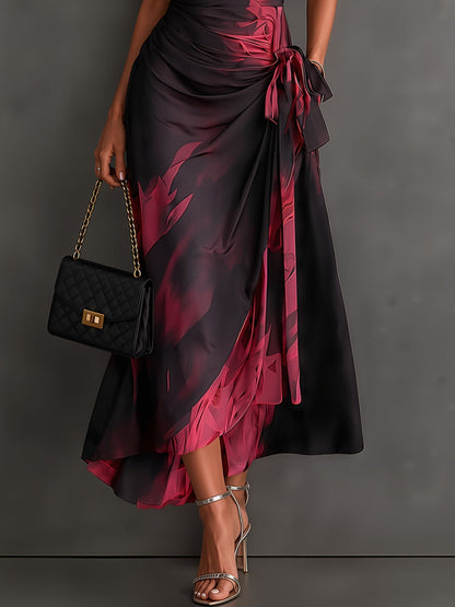 Vestido midi cruzado con estampado abstracto en rojo y negro